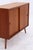 Vintage chest of drawers from Musterring with beautiful teak grain. The understated design and tapered legs give the piece...