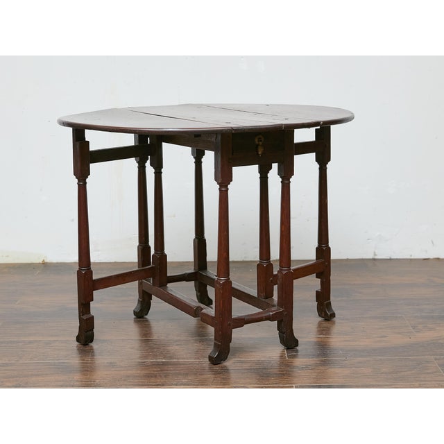 Wood 19th Century English Oak Drop-Leaf Table with Gatelegs and Single Drawer For Sale - Image 7 of 12