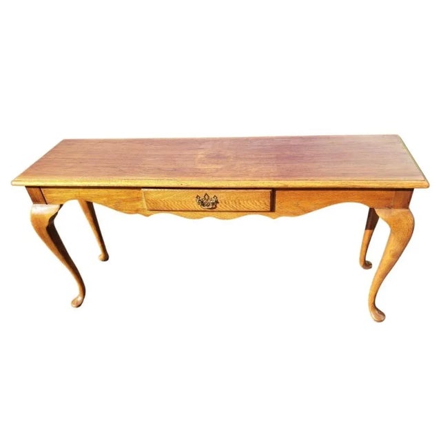 Thomasville 60" Queen Anne Console Table Sofa Table, Circa 1970s. Solid hardwood and Fruitwood. One drawer dovetailed...