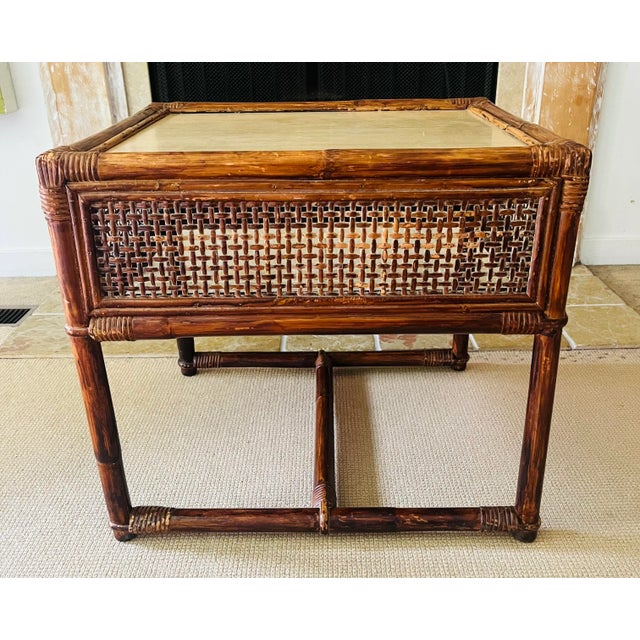 Great for cocktails, playing chess or cards or for your plants. Hailing from the 1960s, this Asian side table features...