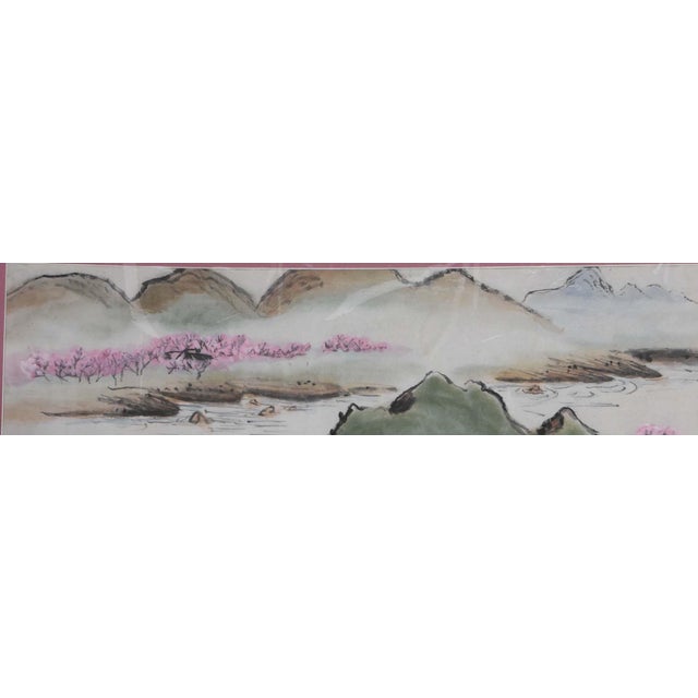 This exquisite watercolor painting depicts a tranquil river valley nestled between rolling, mist-covered mountains. In the...