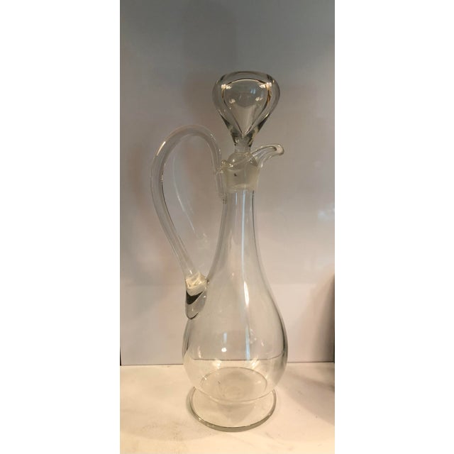 Elevate your tablescape with this stunning 1940s Italian Crystal Decanter With Stopper. This hand-blown Art Deco style...