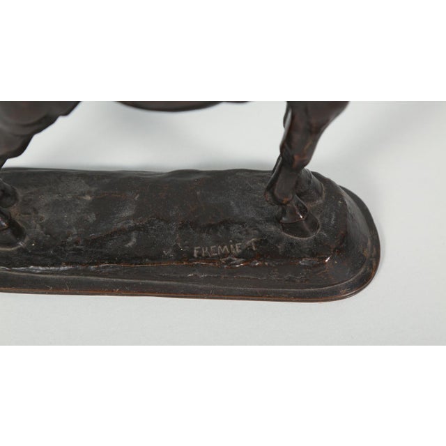 Circa 1861 bronze sculpture with dark brown patina by Emmanuel Fremiet (French 1824-1910). Small horse with cat passenger....