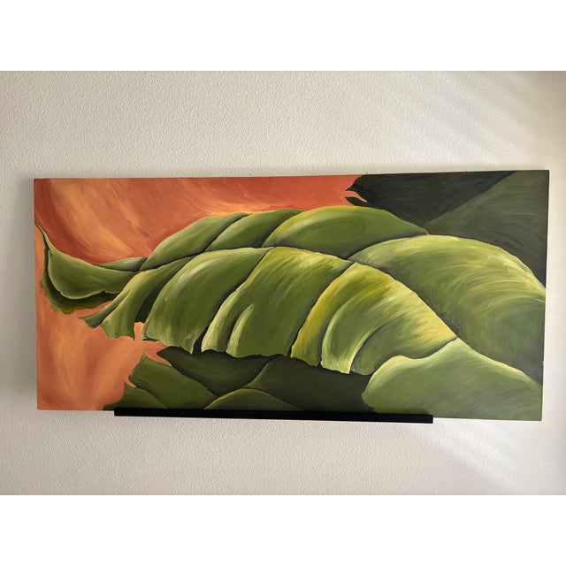 Original 34" × 72" oil on canvas. Contemporary tropical palm composition with rich layered greens and warm sunset tones....