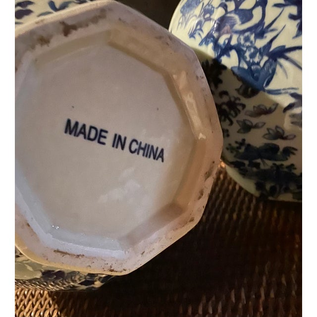 beautiful blue and white, very tall vases which looked absolutely stunning on my large dining room table. I have moved in...