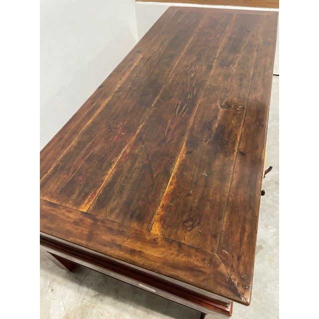 What a wonderful patina on this desk turned coffee table...or what we affectionately call our "coffee/desk" tables. Down...