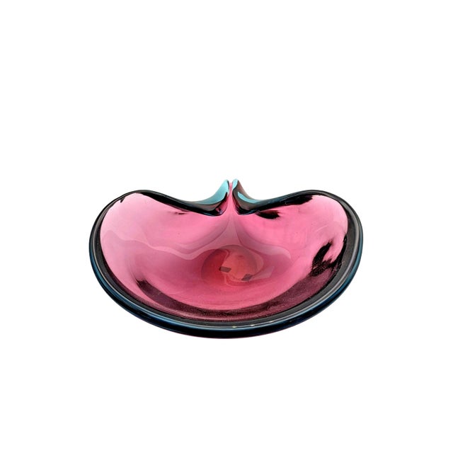 This exceptional, monumental centerpiece bowl is a masterclass in Mid-Century Italian glassmaking. Designed by the...