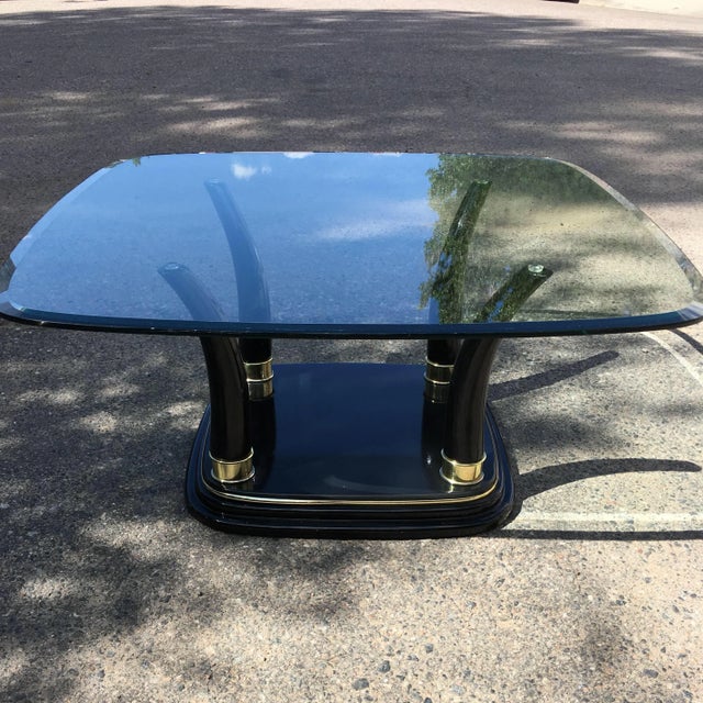 Vintage black lacquered faux elephant tusk hardwood base thick glass top coffee table, manner of Henredon.