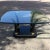 Vintage black lacquered faux elephant tusk hardwood base thick glass top coffee table, manner of Henredon.