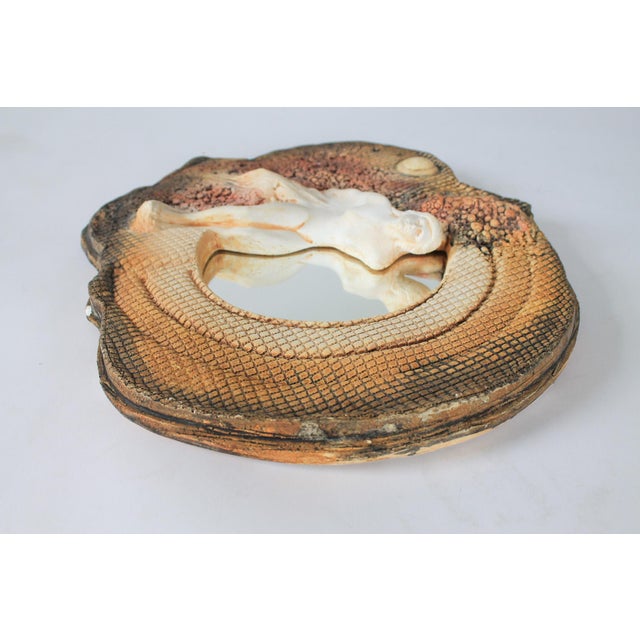 Wall sculpture mirror by renowned Serbian-American artist Marc Sijan, crafted in the late 20th century. Makers mark on...