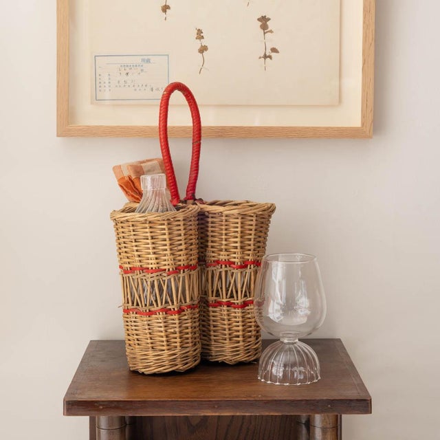 Beautiful wicker bottle holder with three compartments and carrying handle from France, 1950s. Wicker wrapped red handle...