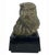 This sculptural eagle head is beautifully modeled with deeply worked feathers, a strong hooked beak, and an expressive,...