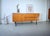 This is a beautifully designed vintage sideboard from the 1960s. The design is characterized by clean, minimalist lines....