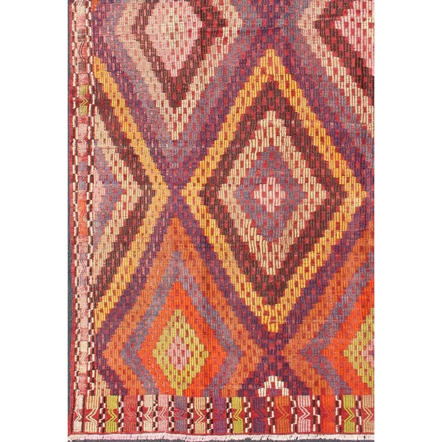 Mid 20th Century Hand Woven Vintage Turkish Embroidered Kilim Rug in Vivid Colors of Purple and Orange For Sale - Image 9 of 13