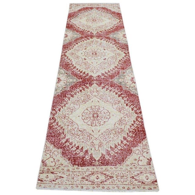 Hand-knotted with care using traditional rug-making techniques, this wool rug blends timeless craftsmanship with a modern...