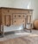 Dimensions: 54"L x 39"H x 19"D Tiger Oak quarter sawn solid wood sideboard / buffet with scalloped apron turned legs,...