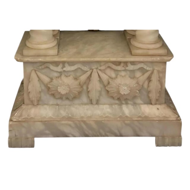 Stunning French ormolu gilt bronze mantel clock from the 19th century, elegantly mounted on a fine carved marble base with...