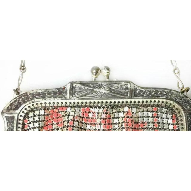 1920's At Deco Flapper mesh purse. It features a kiss-lock clasp and a distinctive "Vandyke" bottom edge. Pristine...