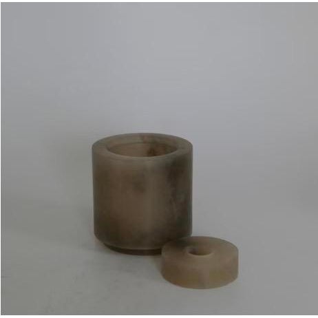 The Petite Vase in Alabaster White and Tabac is crafted from natural stone in a range of tones, embodying minimalist...