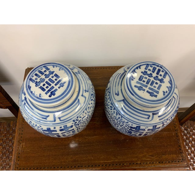 Pair of Chinoiserie porcelain ginger jars with the Double Happiness decoration. Classic blue and white decoration.