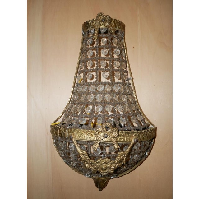 CODE 2760 Pair of Vintage Bronze and Glass Wall Lights Pair of bronze wall lamps with glass drops. 16th-20th century "Hot...