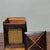 This is an exquisitely crafted wooden tea caddy or storage box, featuring a striking mix of dark and light woods. The main...
