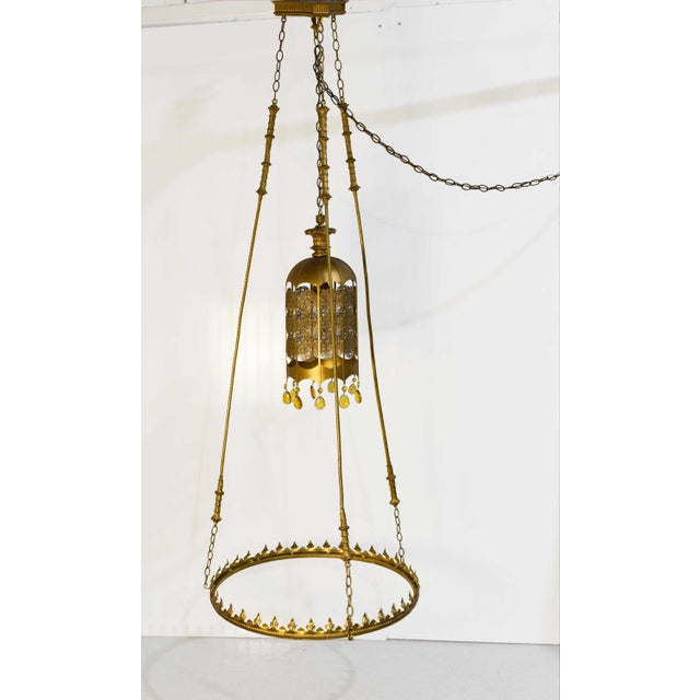 This Mid-Century Gothic Revival Chandelier captures both history and Hollywood Regency flair. Inspired by the grand...