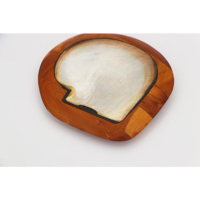 Circa: 1950. Origin: France. Material: Shell and Teak Root Wood. Item condition: Some imperfections along the piece. Age...