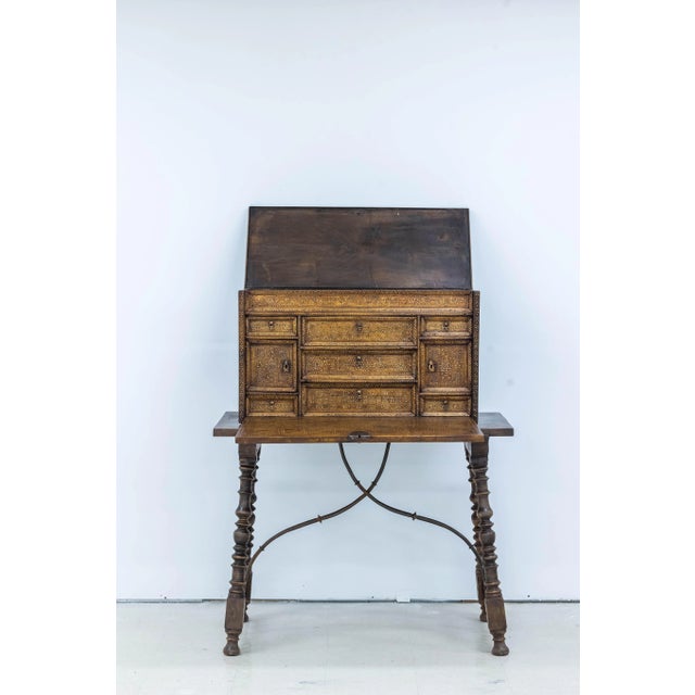 beautiful inlaid bargueño from Spain from the 18th c Mudejar style. Walnut and bone inlaid. It has a secret drawer on the...