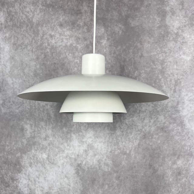 Vintage PH 3/4 Hanging Lamp from Louis Poulsen, 1970s, in Flawless conditions. Designed 1970 to 1979 This piece has an...