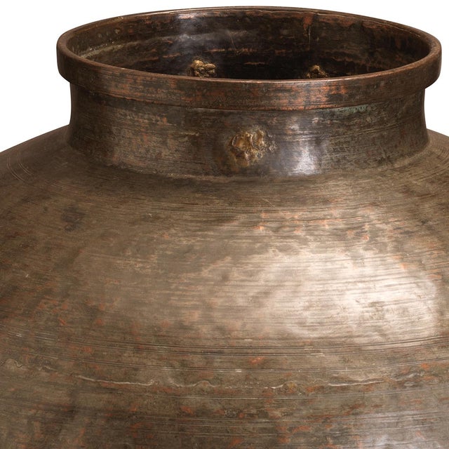 A striking copper water pot handcrafted in Rajasthan during the 1950s, this vessel embodies generations of traditional...