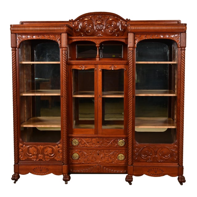 R. J. Horner Style Antique Victorian Carved Cherry Wood Triple Bookcase, Circa 1880s For Sale