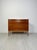 This refined mid-century piece features four spacious drawers and a warm teak construction characteristic of scandinavian...
