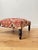 A lovely 19th century French footstool. Newly recovered in kilim printed fabric, and in excellent condition. Measurements:...