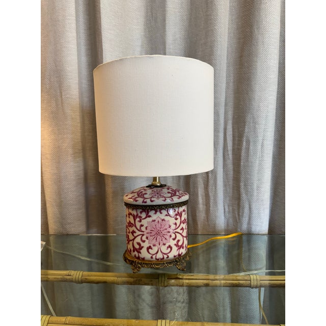 Exquisite vintage hand painted Chinoiserie crackled porcelain pink and Ornolu table lamp.