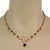 This elegant floral necklace is crafted from 18k yellow gold, the center piece has 4 round cut sapphire on each side,...