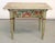 Beautiful antique French desk. This writing desk has wonderful hand painted flowers and trim. It also features a single...