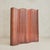 A gentle rhythm of wood and movement, this 1940s tambour room divider, attributed to French designer Jomain Baumann,...