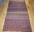 Few vintage Moroccan kilims inspire as immediate a double-take as this mid-20th century example — its palette of deep...