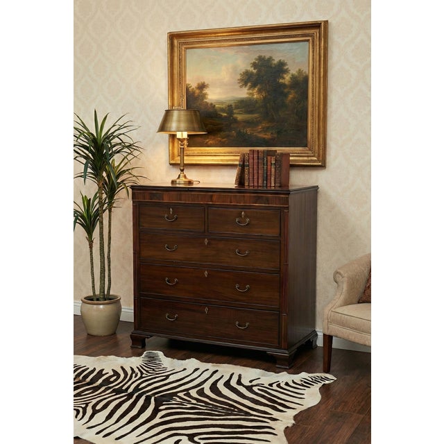 This is a beautiful 19th century William IV flame mahogany Scotch or Scottish chest. It is most likely from Northern...