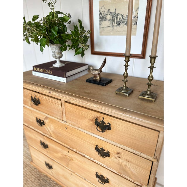 An antique two over three English pine dresser. approximate dimensions: 30.5 tall 42 wide 18 deep