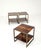 Set of three cubic coffee tables. Made in Italy, dating back to the 1970s. They feature a square brushed brass frame, with...