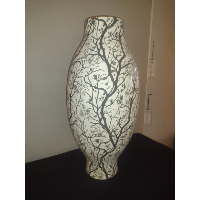 Baker's Large Tenley Vase from The Darryl Carter Collection. The vase is made of White Gloss Ceramic with Black Matte...