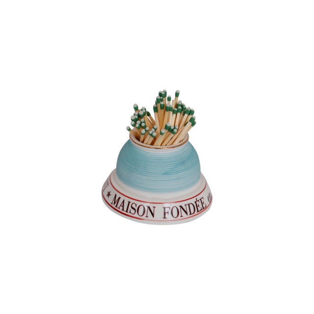 A Parisian café ceramic match striker and holder advertising Absinthe Laurent. Reads around the bottom edge in bold red...