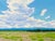 Front Range Skies by Michael Magrin | Oil on linen Landscape with clouds and fields. For Sale