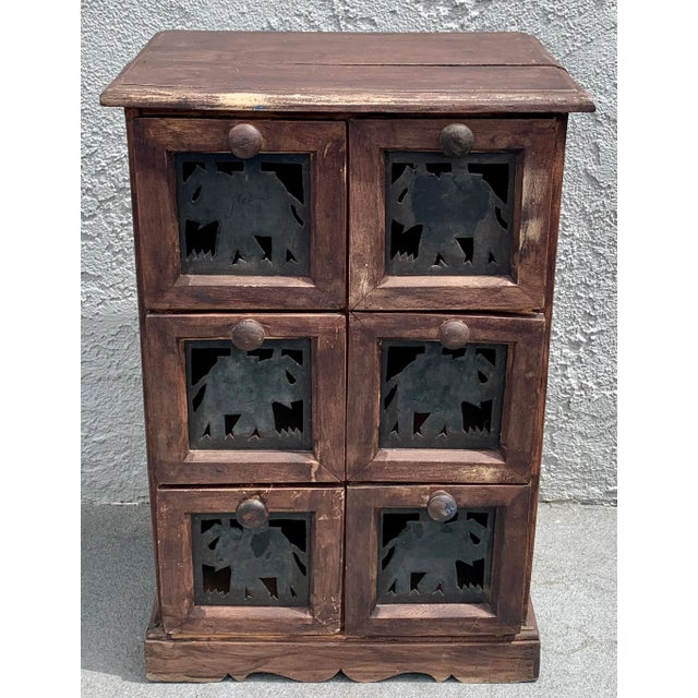 Vintage Indian solid wood 6-drawer apothecary/ storage/ spice chest with metal cut outs that look like elephants. Very...