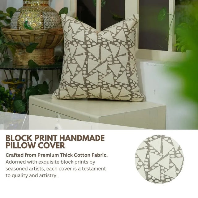 Elevate your space with this block print handmade cushion cover featuring the bold and minimal "Triangle" design. Crafted...