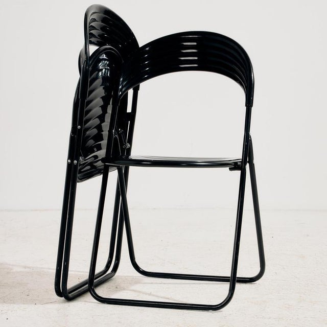 A true postmodern piece that can be a great choice for space saving as well as function. Italian Studio G.P. folding chair...