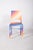 Painted dining chair. With simple lines, it has been updated with contemporary paint in gradient tones that evoke a...
