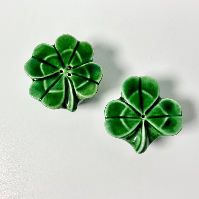 This pair of Trompe L’Oeil style Salt and Pepper Shakers are Shamrocks. They have a majolica high gloss finish over a deep...